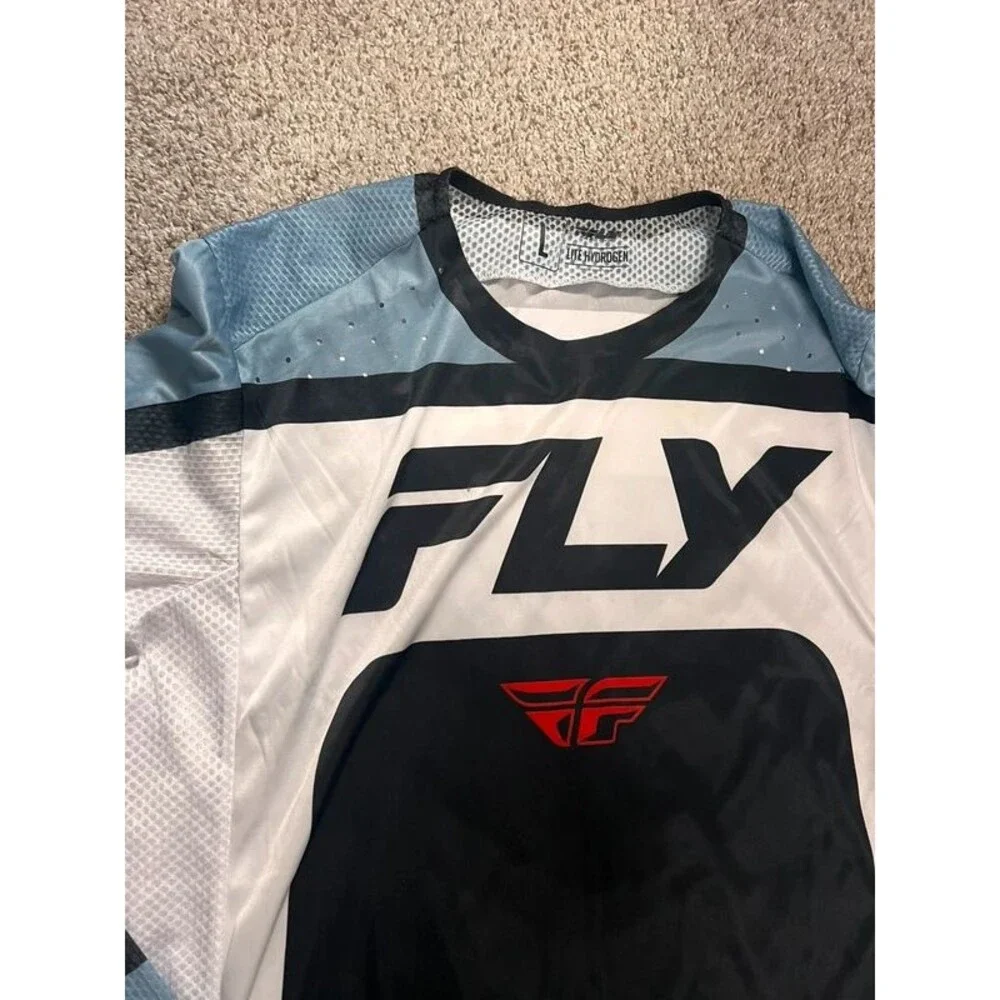 Fly Racing Men’s lite Hydrogen shirt and riding pants large and 34